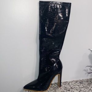 Women’s black crock tall heeled boots